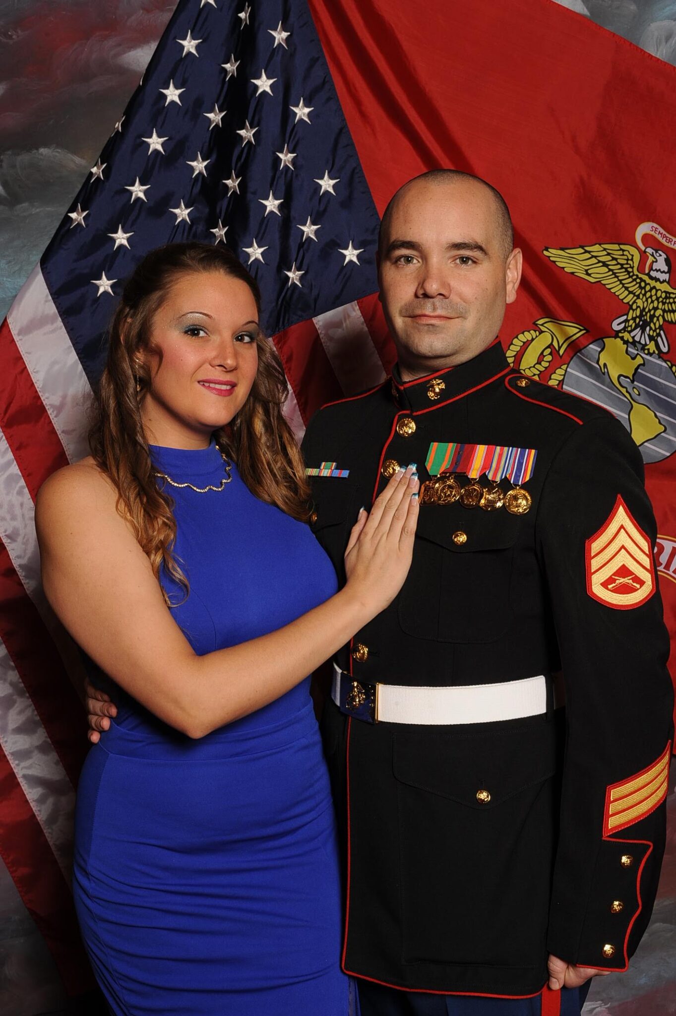 Brian Murdock in uniform and his wife at a military function.
